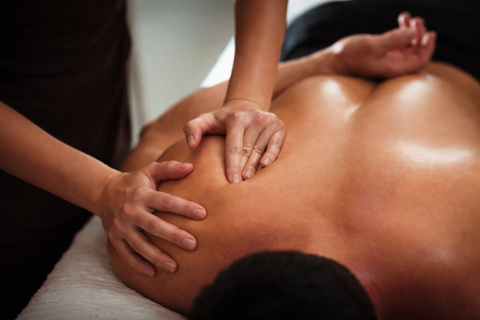 Sports massage treatment in a clinical setting